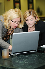 Image showing happy mature woman work on laptop