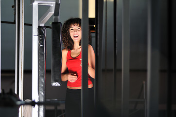 Image showing young woman practicing fitness and working out