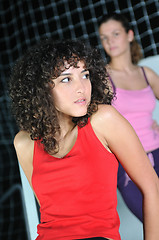 Image showing two women work out   in fitness club