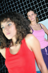 Image showing two women work out   in fitness club