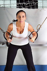 Image showing young woman practicing fitness and working out