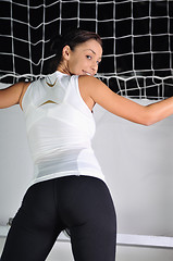 Image showing young woman practicing fitness and working out