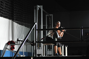 Image showing young woman practicing fitness and working out