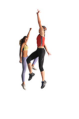 Image showing two womans work out and jumping