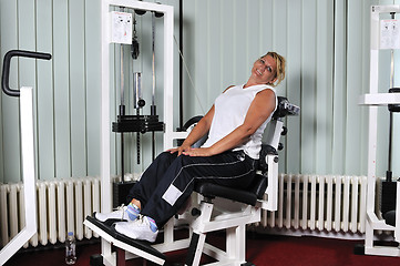 Image showing Mature  woman work out in fitness