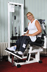 Image showing Mature  woman work out in fitness