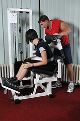 Image showing Young woman doing fitness in gym