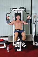 Image showing Strong  man work out in gym