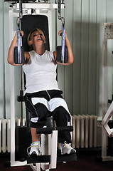 Image showing Mature  woman work out in fitness