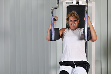 Image showing Mature  woman work out in fitness