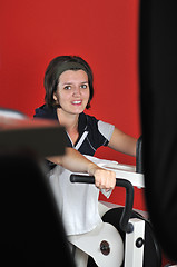 Image showing Young woman doing fitness in gym