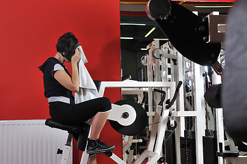 Image showing Young woman doing fitness in gym