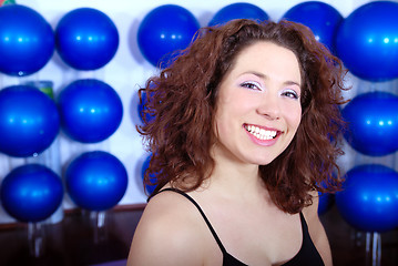 Image showing happy girl in fitness studio