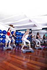 Image showing girls stepping in a fitness center