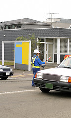 Image showing Man directing traffic