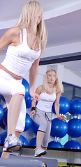 Image showing girls stepping in a fitness center