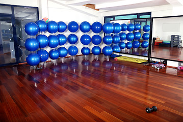 Image showing fitness studio with blue pilates balls