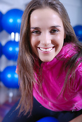 Image showing happy girl in fitness studio