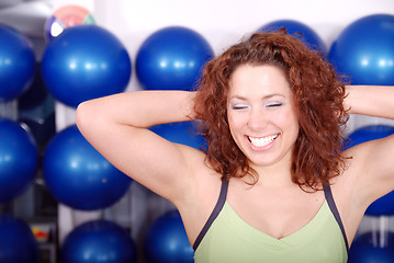 Image showing happy girl in fitness studio