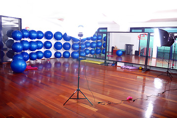 Image showing fitness studio with blue pilates balls