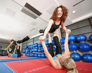 Image showing Flexible girls in fitness studio