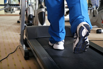 Image showing running on a treadmill