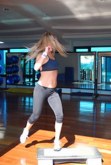 Image showing women stepping in a fitness center 