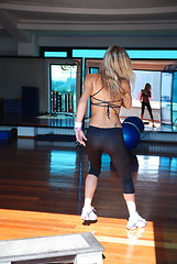Image showing girl exercising in fitness studio