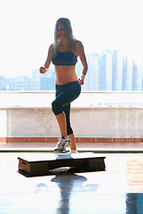 Image showing women stepping in a fitness center 