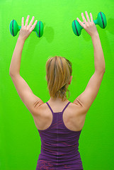 Image showing pretty woman with dumbbell