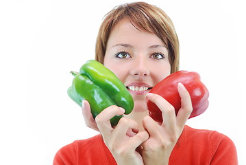 Image showing pretty girl with pepper isolated