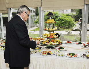 Image showing people catering food
