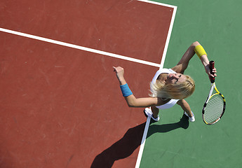 Image showing young woman play tennis game outdoor