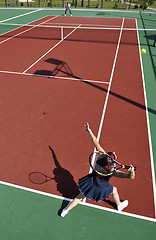 Image showing young woman play tennis game outdoor