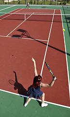 Image showing young woman play tennis game outdoor