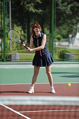 Image showing young woman play tennis game outdoor