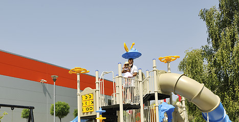 Image showing family portrait at park playground