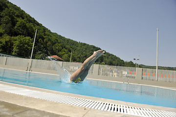 Image showing beautiful woman relax on swimming pool