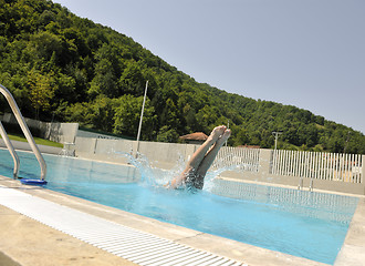 Image showing beautiful woman relax on swimming pool