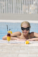 Image showing beautiful woman relax on swimming pool