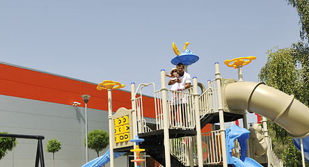 Image showing family portrait at park playground