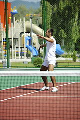 Image showing young man play tennis outdoor