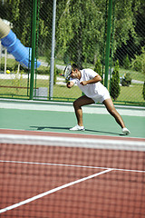 Image showing young man play tennis outdoor