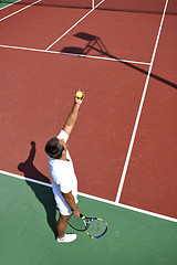 Image showing young man play tennis outdoor