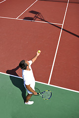 Image showing young man play tennis outdoor