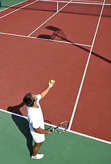 Image showing young man play tennis outdoor