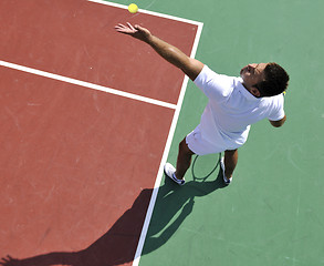 Image showing young man play tennis outdoor