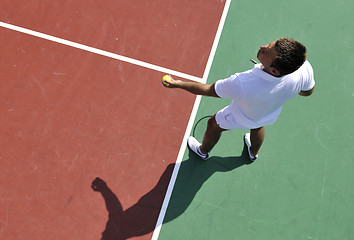 Image showing young man play tennis outdoor