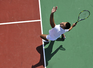 Image showing young man play tennis outdoor