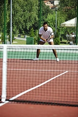 Image showing young man play tennis outdoor